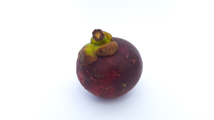 Close up of ripe mangosteen fruit isolated on white background