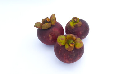Close up of ripe mangosteen fruit isolated on white background