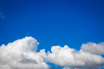 A blue sky white clouds on nature summer weather background