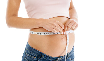 Pregnancy, measuring tape and woman stomach in studio to check growth, development and health on mockup. Abdomen, wellness and pregnant woman self care, diet and healthy progress on white background