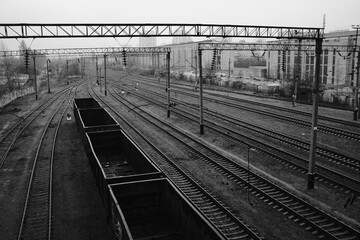 wagons at the railway station black and white