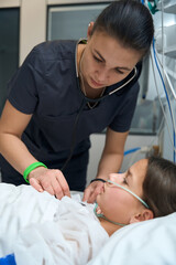 Nurse checking health of young lady in clinic