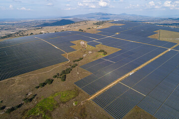 Aerial view over a large solar energy farm for the supply of renewable energy in Mexico