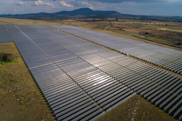 Aerial view over a large solar energy farm for the supply of renewable energy in Mexico