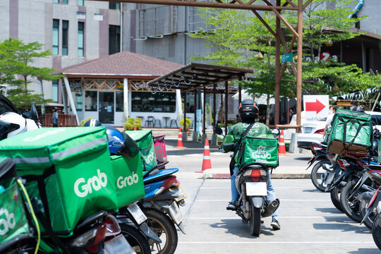 Grab Food Or Grab Bike . Food Delivery By Motorcycle At Thailand