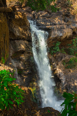 Obraz premium Arvalem waterfall in March. Goa. India
