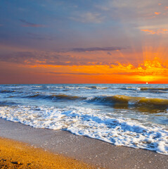 Fototapeta na wymiar summer sandy sea beach at the sunset