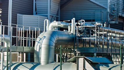 construction of metal pipes at the heating station close-up