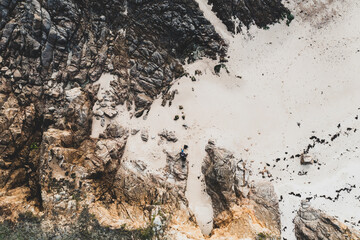 Sea landscape, drone view ocean coast, rocks and ocean in vintage tones.