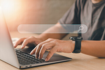 technology search engine optimization( SEO) male hand using laptop computer searching information...