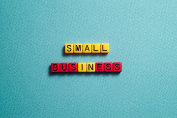 Small business - word concept on cubes, text