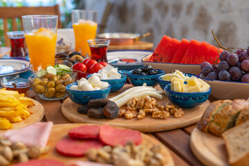 Breakfast buffet table filled with assorted foods