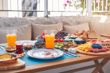 Breakfast buffet table filled with assorted foods