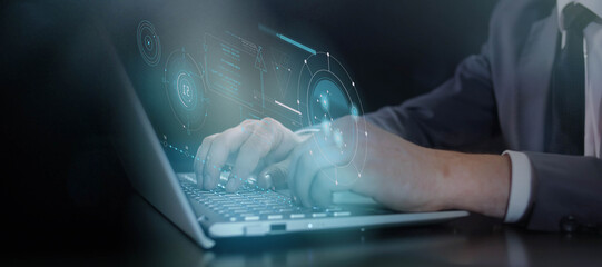 Hands typing on keyboard and virtual infographic data