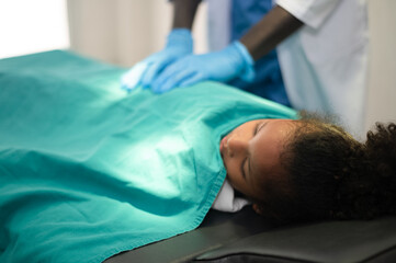 Doctor surgical cancer with kid. professional surgical doctor team operating surgery a patient in the operating room at hospital.