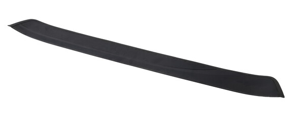 A black plastic decorative door sills in an automobile parsing for sale or repair in a workshop on...