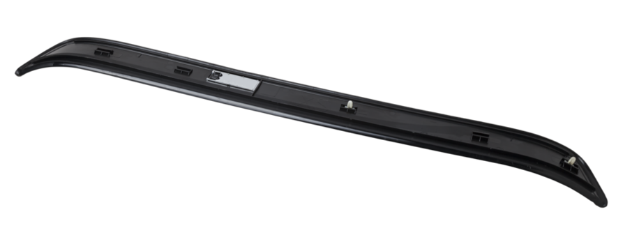 A black plastic decorative door sills in an automobile parsing for sale or repair in a workshop on a white isolated background in a photo studio.