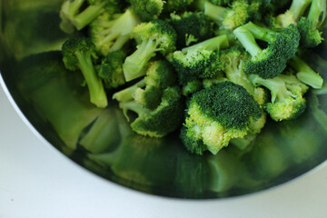 Hot boiled broccoli cabbage in a bowl