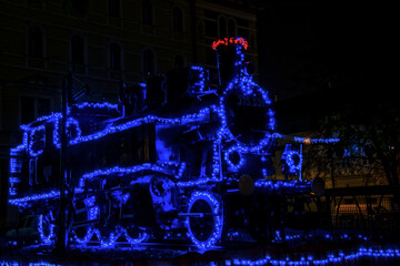 Steam locomotive train in the night city of Szeged