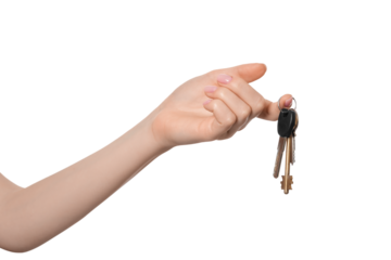 Bunch of keys in a woman's hand on a white background, isolate.
