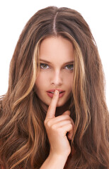 Naklejka premium Secret, beauty and young woman portrait with natural beauty and whisper hand sign. Model, mouth and isolated person with white studio background looking sexy and beautiful with silence gesture