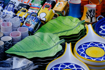 Hand made colorful ceramic pottery. Hand painted pottery. Traditional pottery fair in Pune, India. - Powered by Adobe