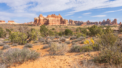 hiking the chesler park loop trail in the needles in canyonlands national park, usa