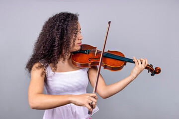 African american professional violinist woman playing violin