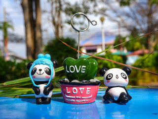 The cuteness of panda bears in the festival of love Valentine's Day clear image after blur © Pichet