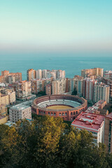 Obraz premium Aerial view of plaza de toros in Malaga, Spain - creative edit, urbanisation concepts