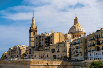 Fototapeta na wymiar Saint Paul's church and surrounding buildings in Valetta, Malta