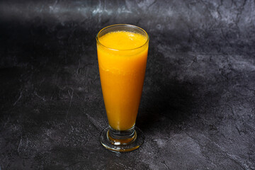 Papaya Juice served in glass isolated on grey background top view of indian and bangladesh food