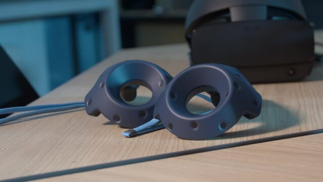 Metaverse Virtual Reality blue controller on the tablet with blue light