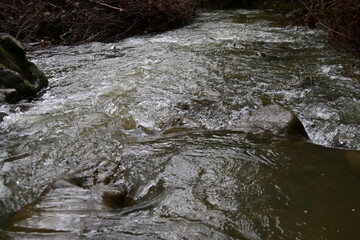 water flowing into the river