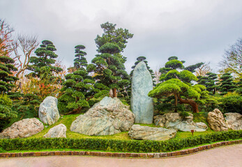 Superb View of the cliffs in Nan Lian Park with idyllic topiary podocarpus and pine trees. Entrance to the garden