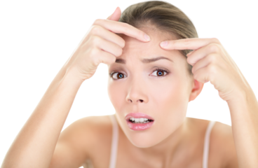 Acne spot pimple spot skincare beauty care girl pressing on skin problem face. Woman with skin blemish looking at mirror isolated white background. Beautiful young Asian Caucasian female model.