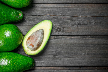 Ripe avocado and one half avocado.