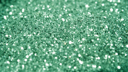 Glamour shine confetti falling down. Silver sequins fall on the black floor