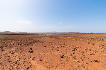 Fototapeta na wymiar Desert landscape with mountains terraine. Caldera of an ancient volcano.