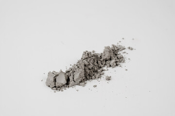 Silicon carbide abrasive powder for leveling stones isolated on white background. Silicon carbide...