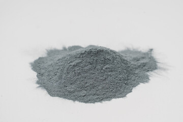Silicon carbide abrasive powder for leveling stones isolated on white background. Silicon carbide...