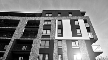 Apartments in residential complex. Housing structure at modern house.  Architecture for property investment. and architecture details. Urban abstract - windows of apartment building. Black and white.