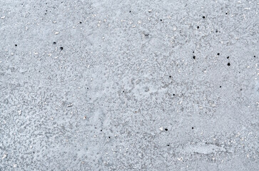 Natural gray grunge cement wall texture. Can be used as an abstract background with copy space.