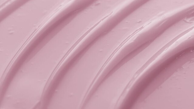 Jib macro texture of pink nourishing cream with rose oil | Nourishing cream commercial