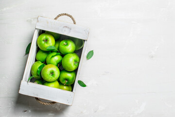The apples in the box.