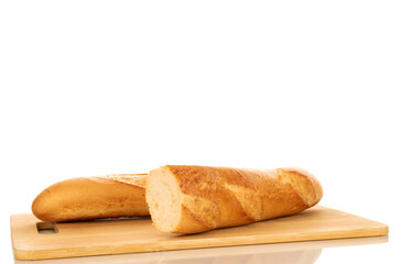 Two halves of a fresh fragrant baguette on a wooden board, macro, isolated on a white background.