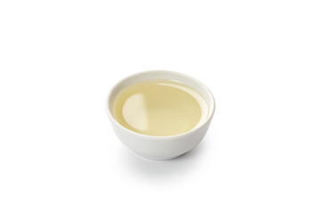 Obraz na płótnie Canvas Olive oil in a white little bowl, gravy boat isolated on white background with clipping path, cut out.