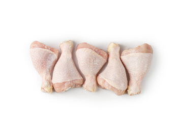 Fresh uncooked raw chicken legs drumsticks isolated on a white background with clipping path, cut out. .
