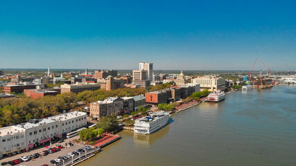 Fototapeta premium Aerial view of Savannah skyline and river from drone - Georgia - USA