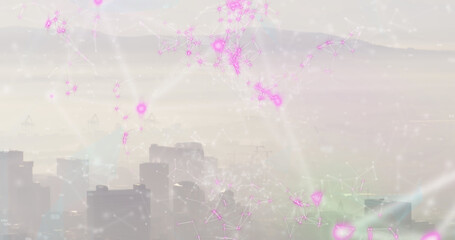 Image of connections and code floating over cityscape